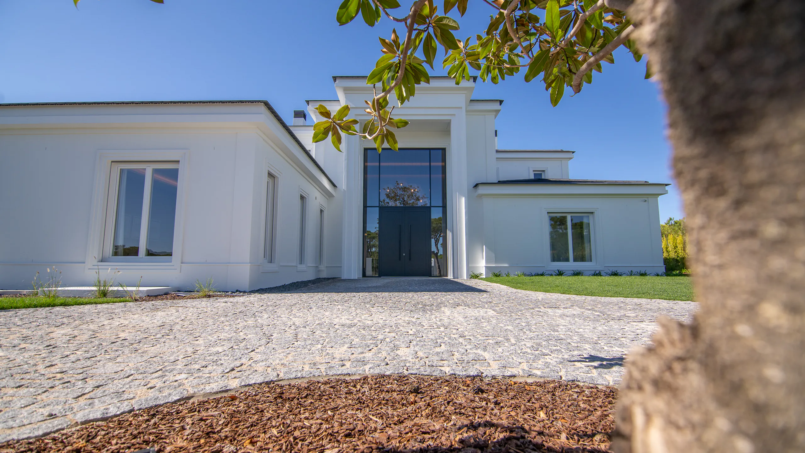 Contemporary entrance set within a refined southern residence