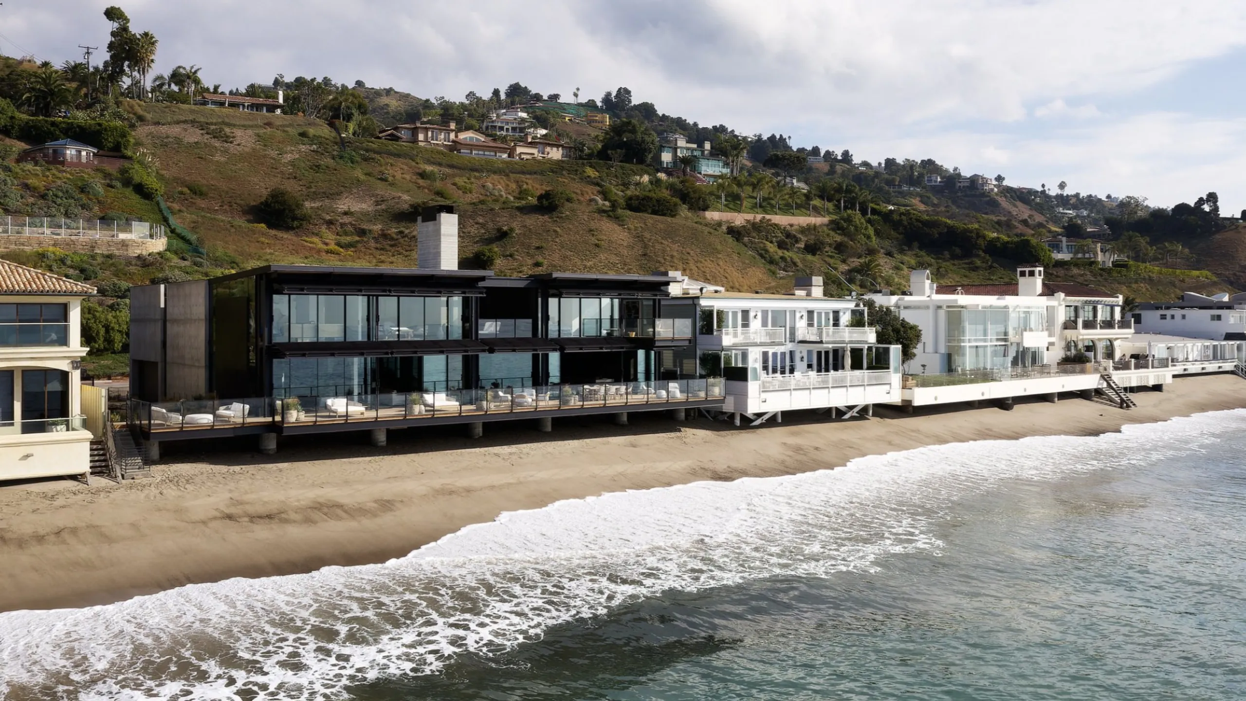 Oceanfront architecture meeting an exposed coastline