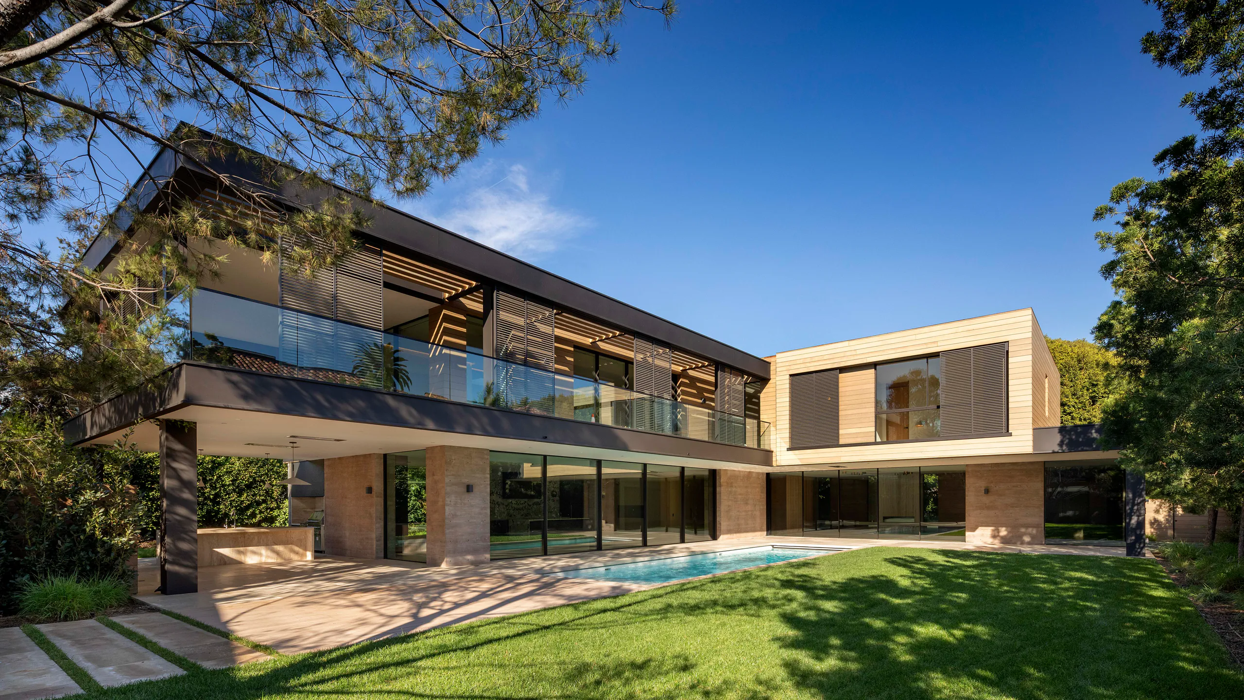 Contemporary residence opening to a mature southern garden